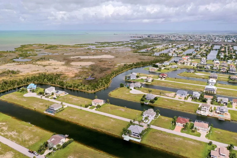 Properly maintained air conditioning condenser unit on a coastal Florida property and keep HVAC and ac repair near me section but capitalize the Near Me text and unlink the Hernando beach link because that is this page