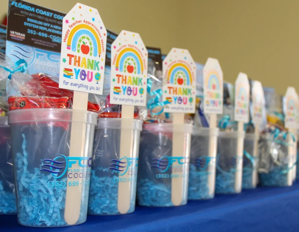 IMG_20260722_150319-reduced Florida Coast Cooling Teacher Appreciation gift cups with Happy Teacher Appreciation Week thank-you tags at Winding Waters K-8