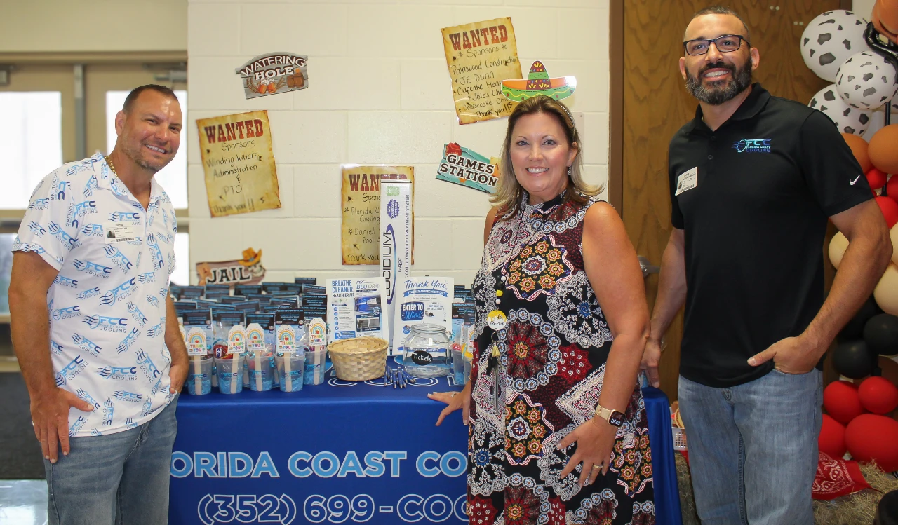 Florida Coast Cooling team at the Winding Waters K-8 Teacher Appreciation Week sponsorship table in Weeki Wachee, Florida